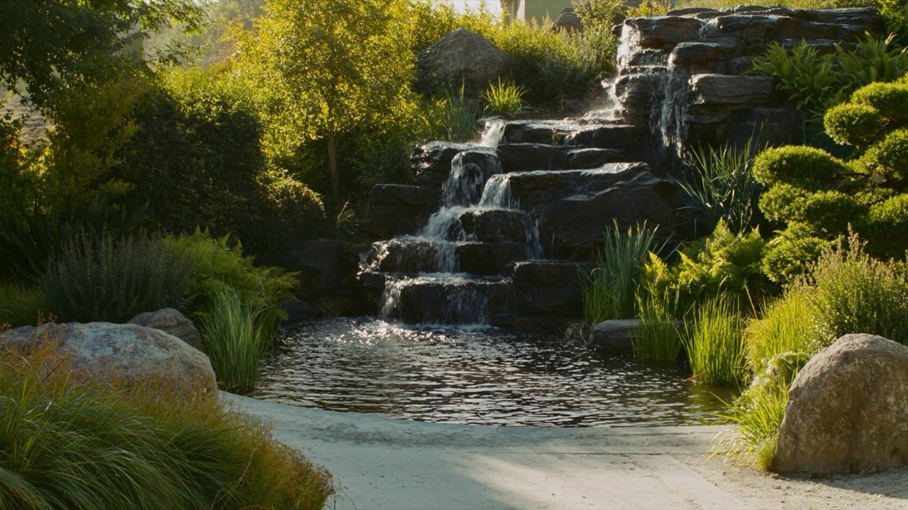 Tiered natural stone water cascade